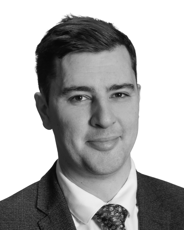 a black and white portrait photo of chris simmonds