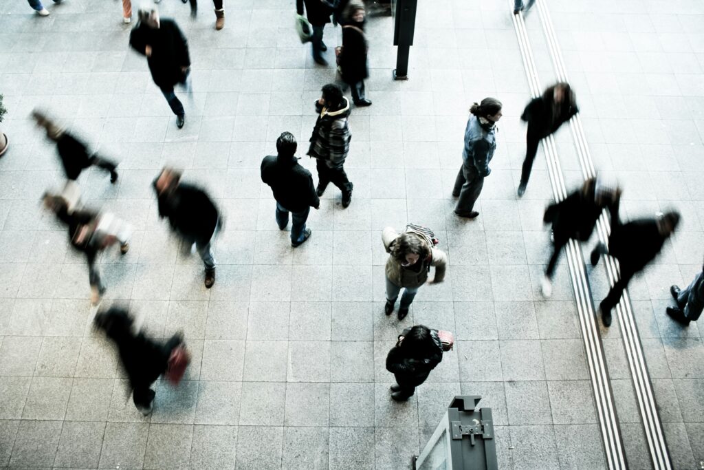 a photo showing people on the move in different directions